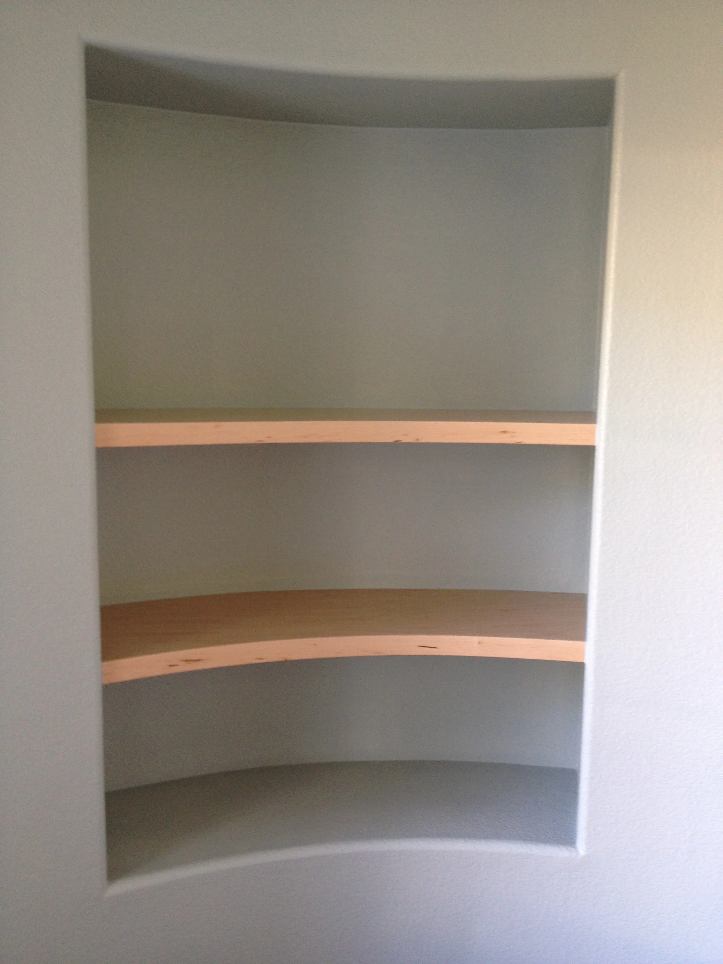 Alternate view of the curved built-in shelving