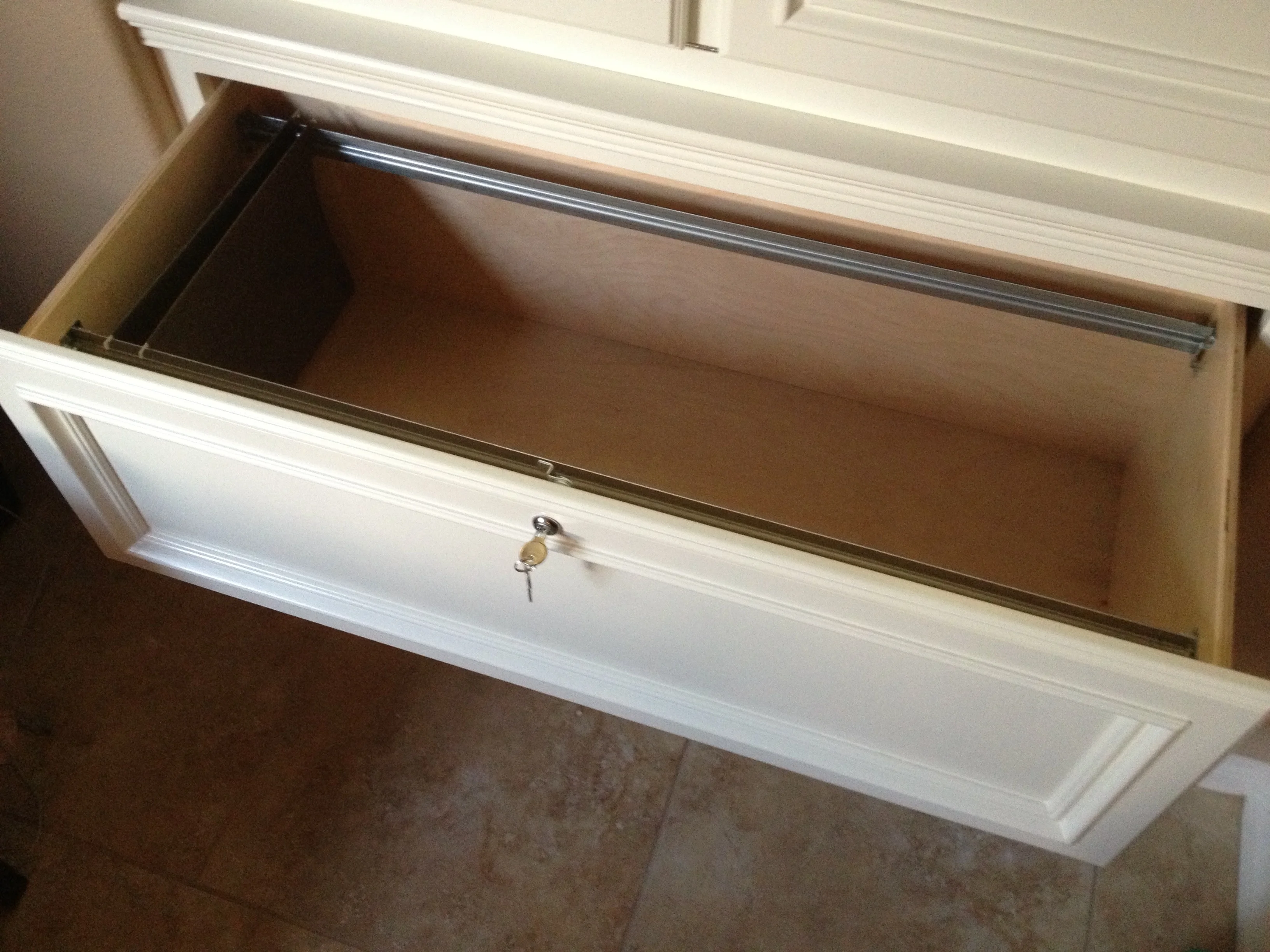 Open lower storage compartment in the secretary cabinet